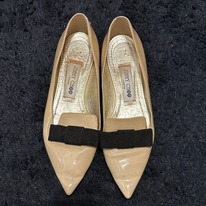 Jimmy Choo Nude Patent Leather Flats with Black Bow